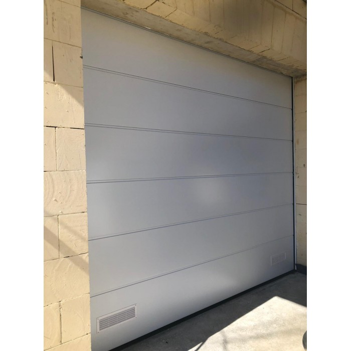 Ben Malta Ltd Insulated overhead sectional garage door